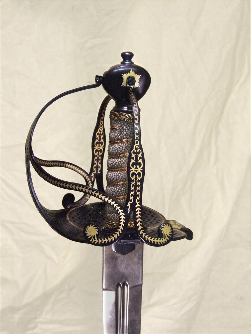 Reproduction of Cromwell sword traditionally carried by Oliver Cromwell,
						at the taking of Drogheda in 1649.