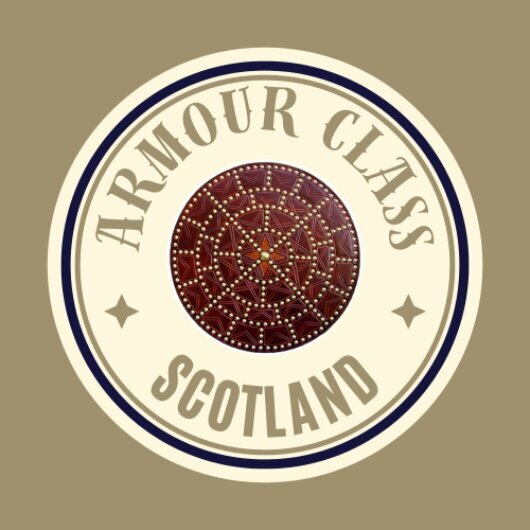 Armour class scotland logo round a targe,