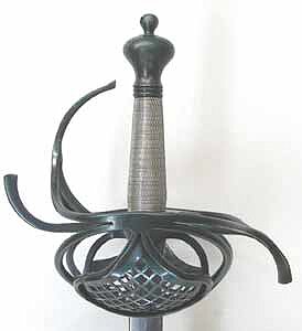 Hilt only. Diamond and clubs pierced shell guards with silver wire grip.