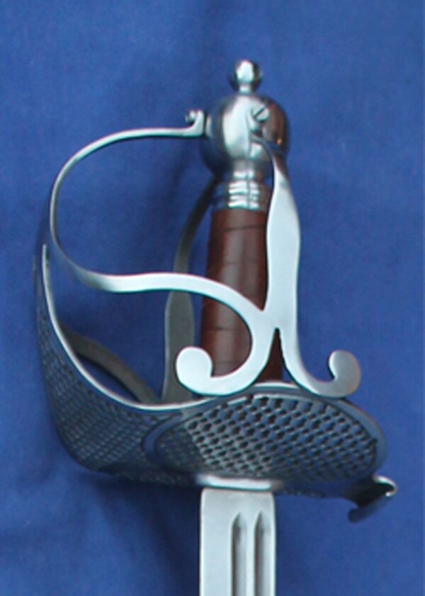 Mortuary hilt with pierced decoration Hilt polished