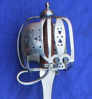 Polished dragoon hilt only. Panels pierced with circle and diamond patterns.
