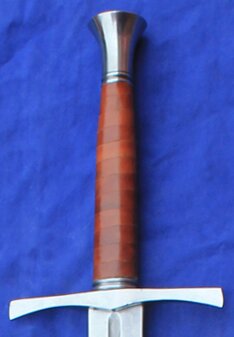 14th Century Hand & Half diamond section medieval sword with leather grip. Bulb pommel and batwing shaped qiuillon.
						Blade dimensions available  blade 89cm 3.8cm at hilt tapering to 1.9cm at tip
						Blade 89cm 5cm at hilt tapering to 2.5 cm at tip