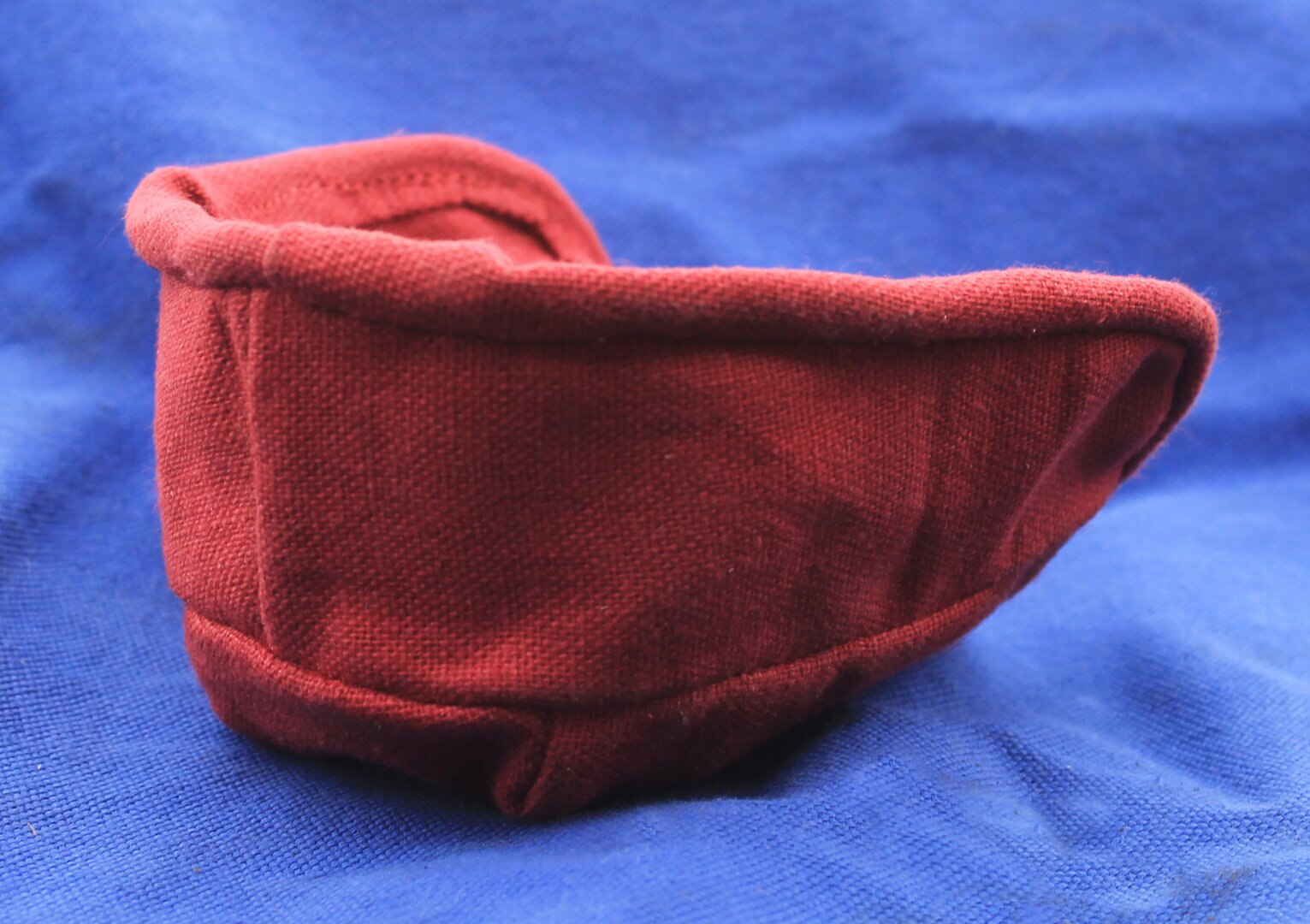 Red linen on leather basket liner