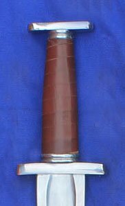 Sword with a simple bar pommel and wide fuller