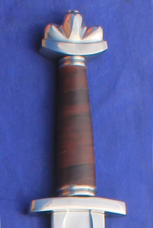 Viking/Saxon sword 10th-11th Century with 3 lobed pommel.
						Leather grip as standard.
						Various blade dimensions in cm available please confirm when ordering - 
						
						1.	66cm Blade  5cm Hilt  2.5cm Tip
						2.	76cm Blade  5cm Hilt  2.5cm Tip
						3.	76cm Blade  5cm Hilt  1.9cm Tip
						4.	76cm Blade  3.8cm Hilt  2.5cm Tip
						5.	76cm Blade  3.8cm Hilt 1.9cm Tip
						