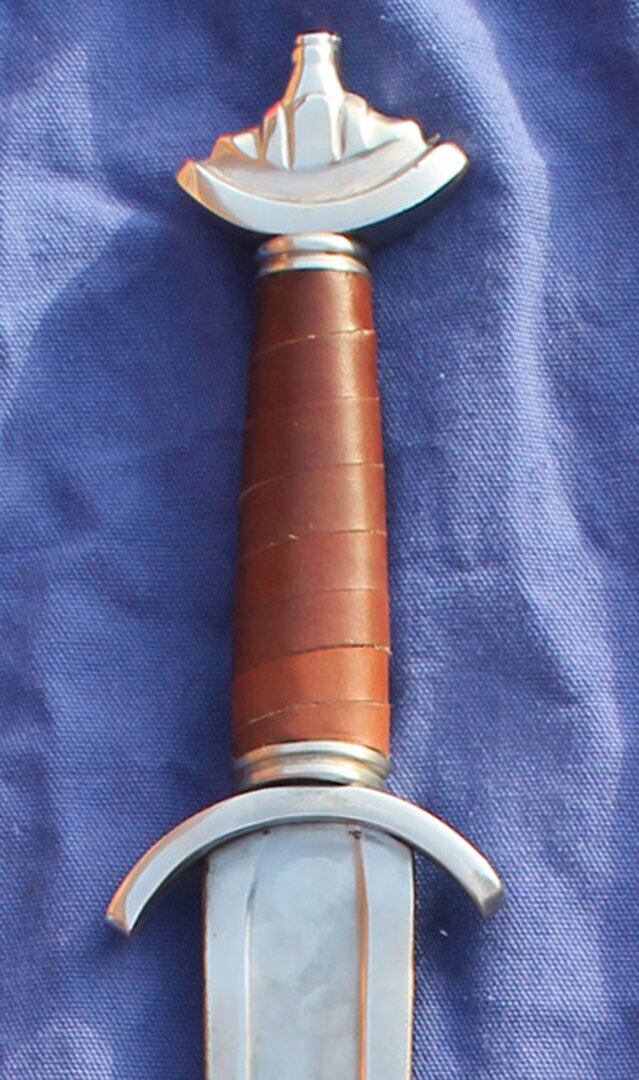Saxon sword 9th-10th Century based on the gilling sword . 
						Leather grip as standard.
						Various blade dimensions available please confirm when ordering - 
						
						1.	66cm Blade  5cm Hilt  2.5cm Tip
						2.	76cm Blade  5cm Hilt  2.5cm Tip
						3.	76cm Blade  5cm Hilt  1.9cm Tip
						4.	76cm Blade  3.8cm Hilt  2.5cm Tip
						5.	76cm Blade  3.8cm Hilt 1.9cm Tip
						